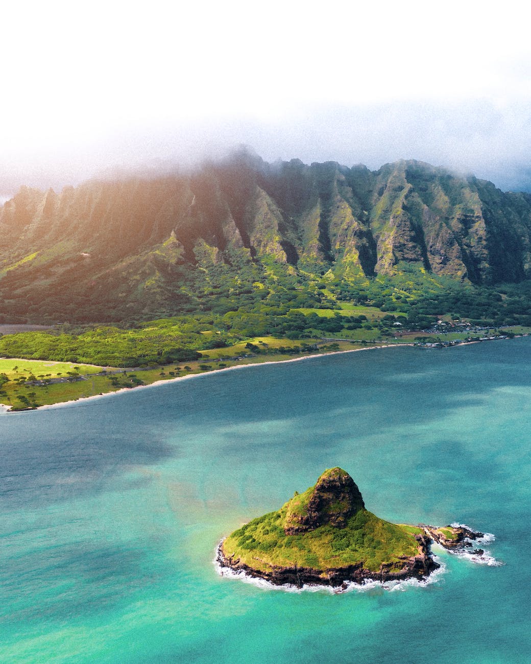 view of mokolii island chinaman s hat and koolau mountains in distance